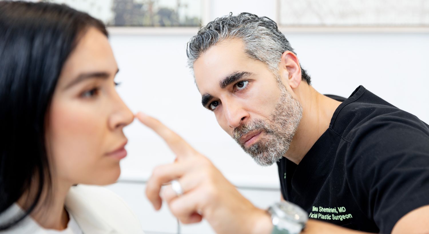 Consultation between a surgeon and patient.