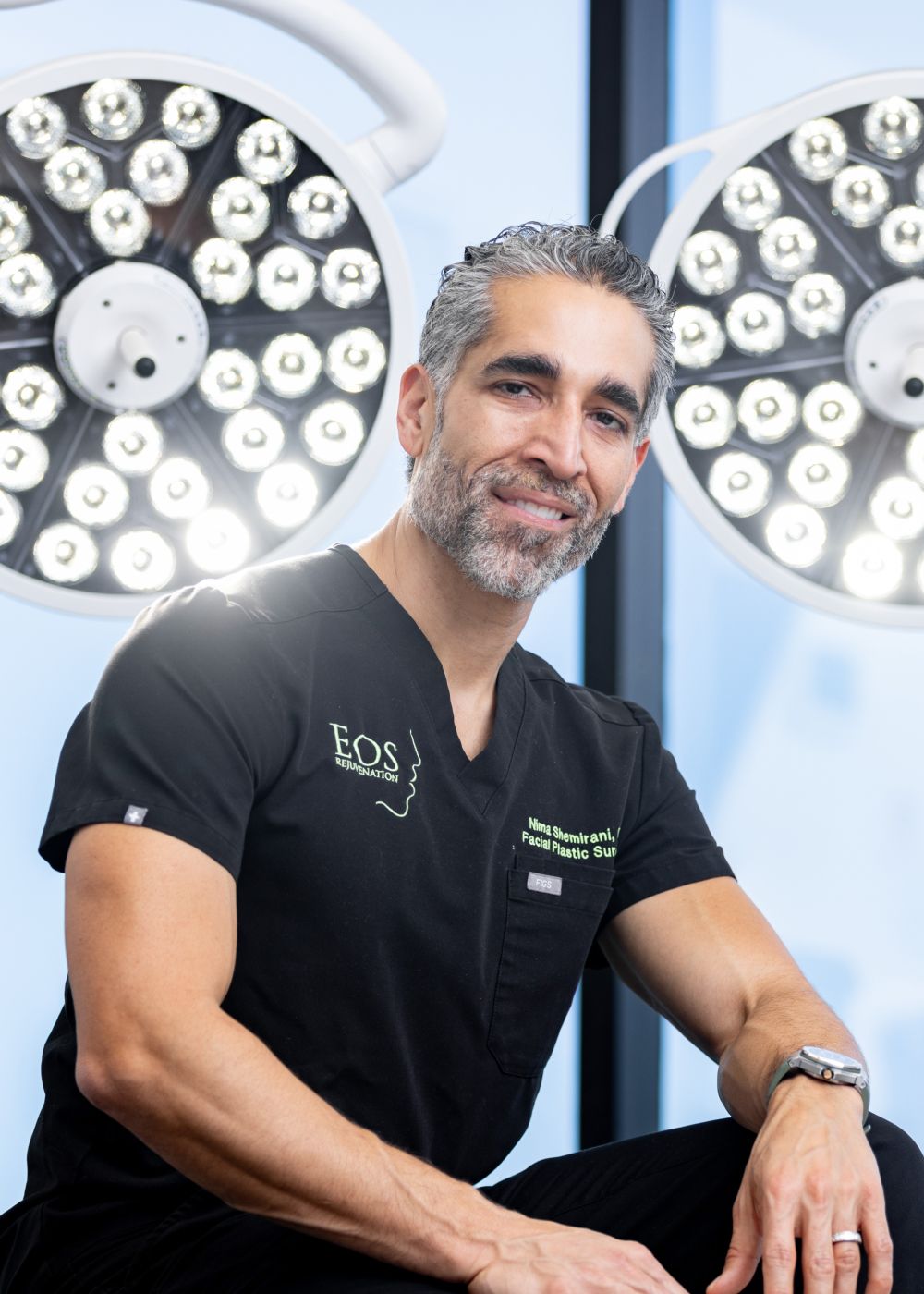 Dr. Nima Shemirani posing in operating room